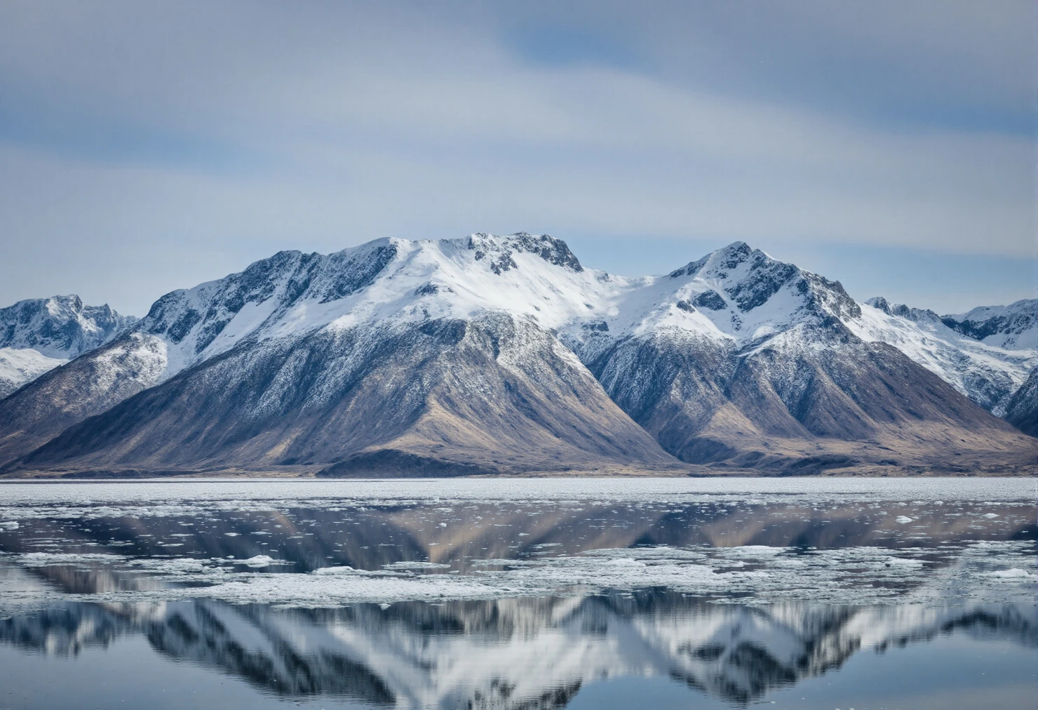 Snow-Capped Mountains Reflecting on Icy Water #40173