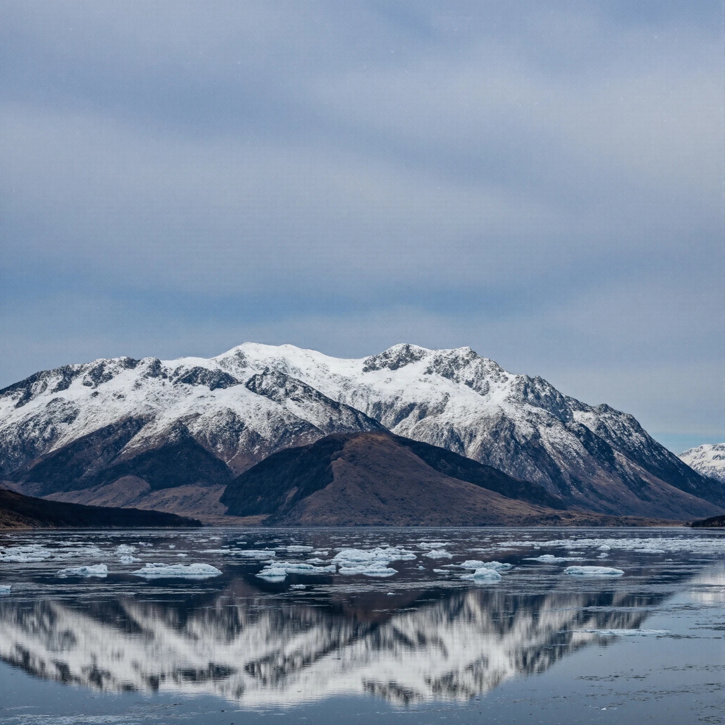 Snow-Capped Mountains Reflecting on Icy Water #40175