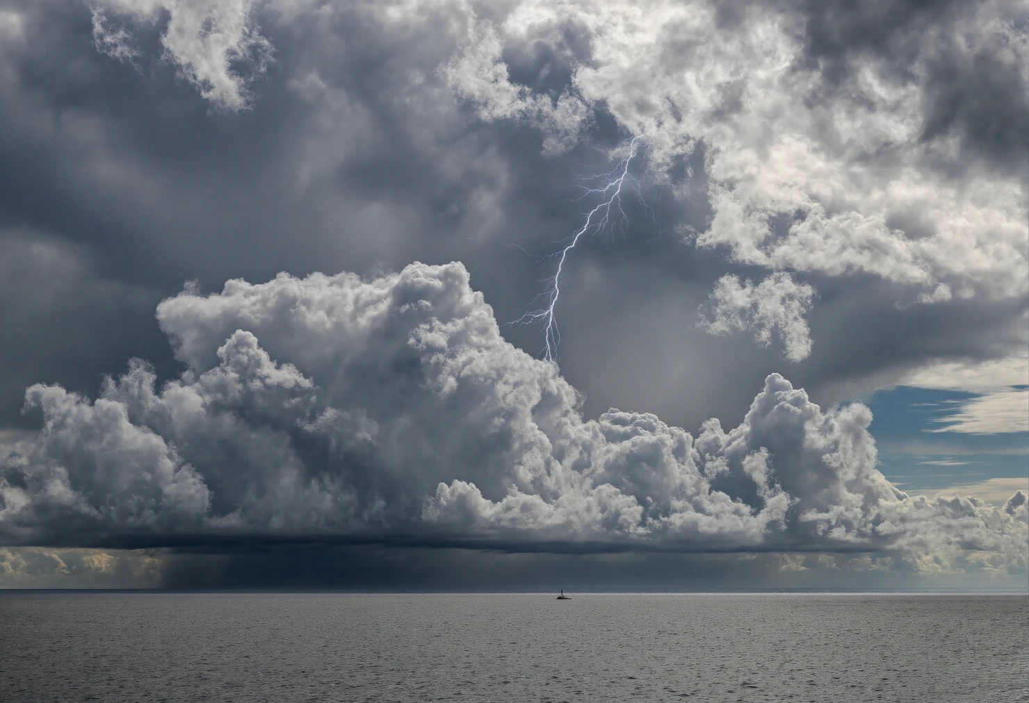Stormy Sky Over Ocean with Lightning Strike #40203