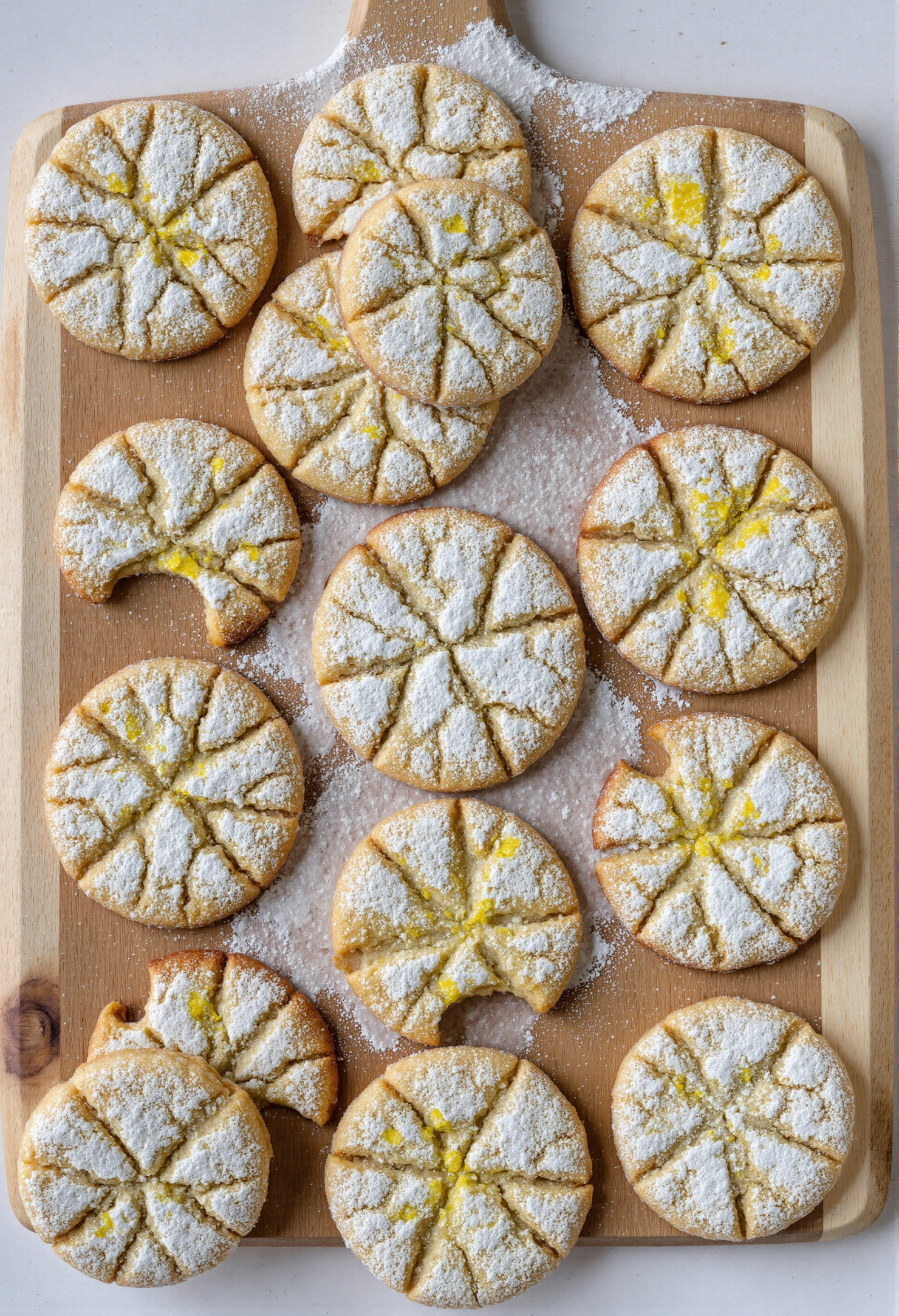 Delicious Lemon Powdered Sugar Cookies on a Wooden Board #40781