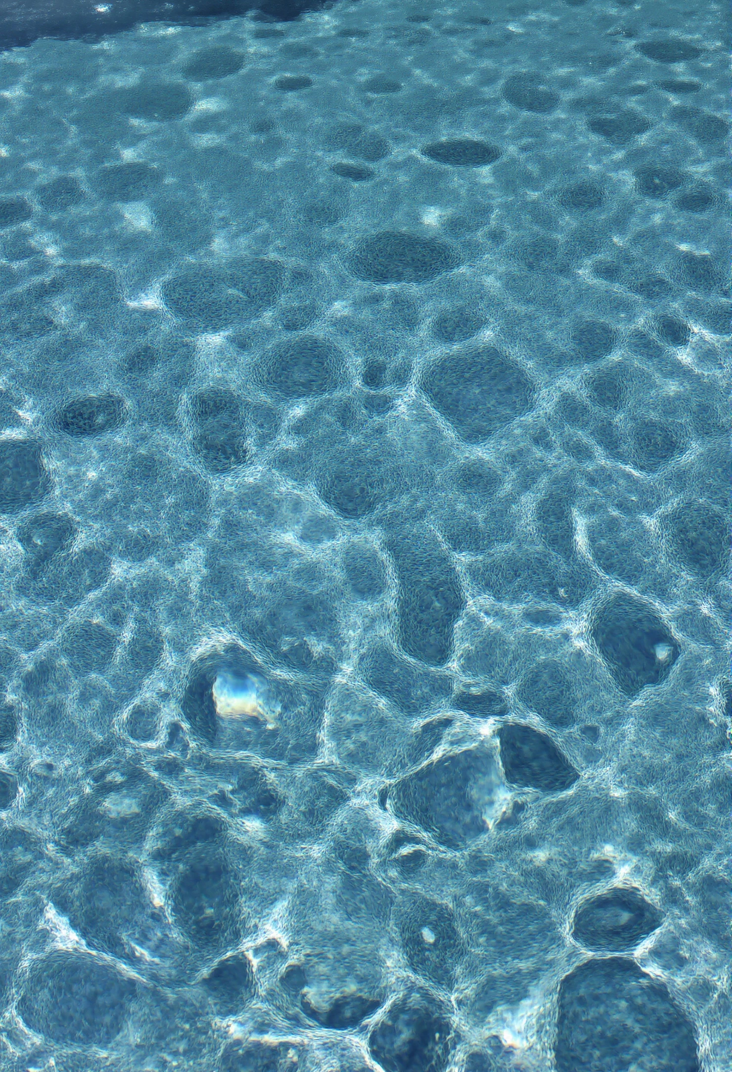 Shimmering Blue Water Refractions in a Pool #40953