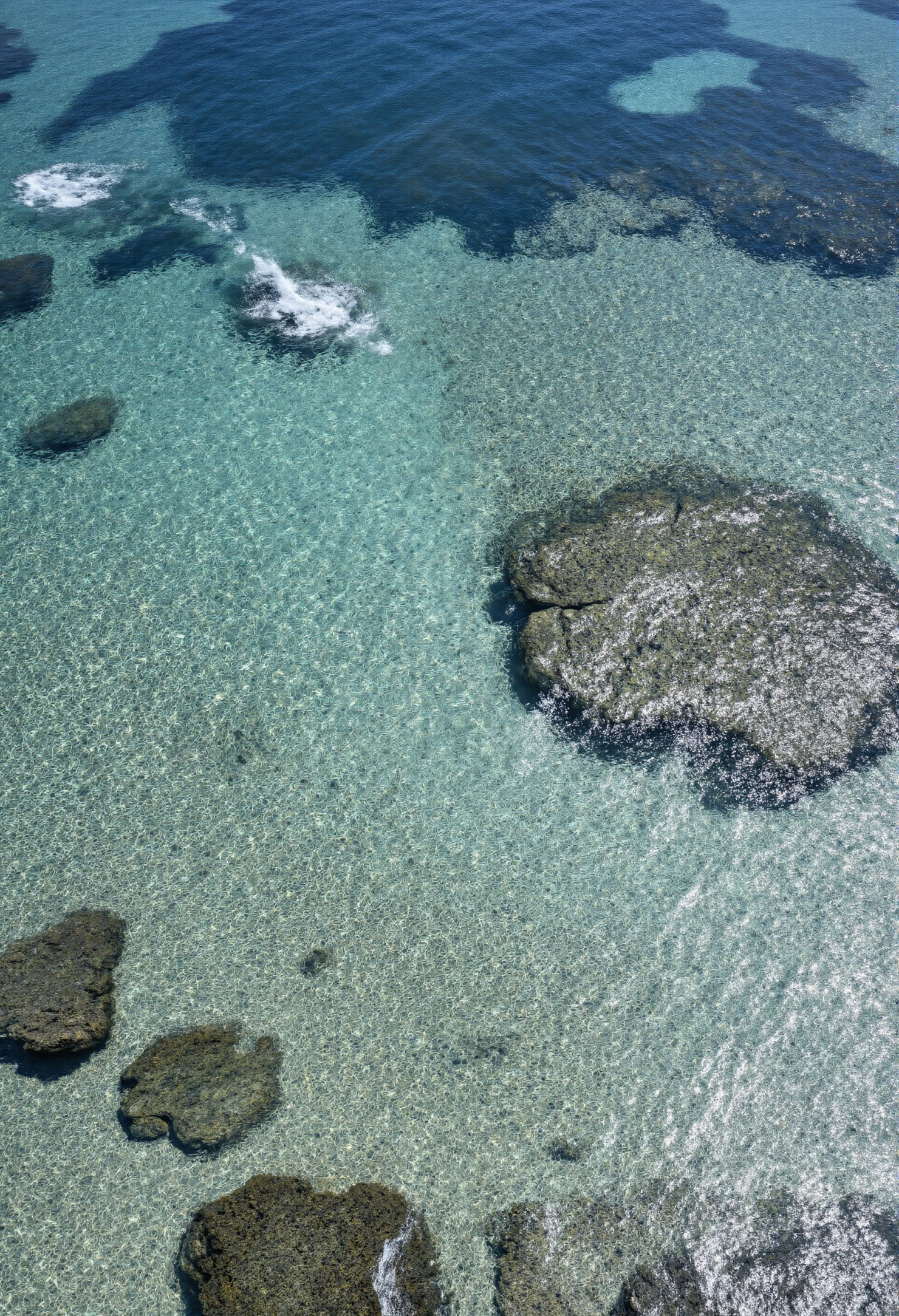 Aerial View of Crystal Clear Tropical Sea with Submerged Rocks #40954