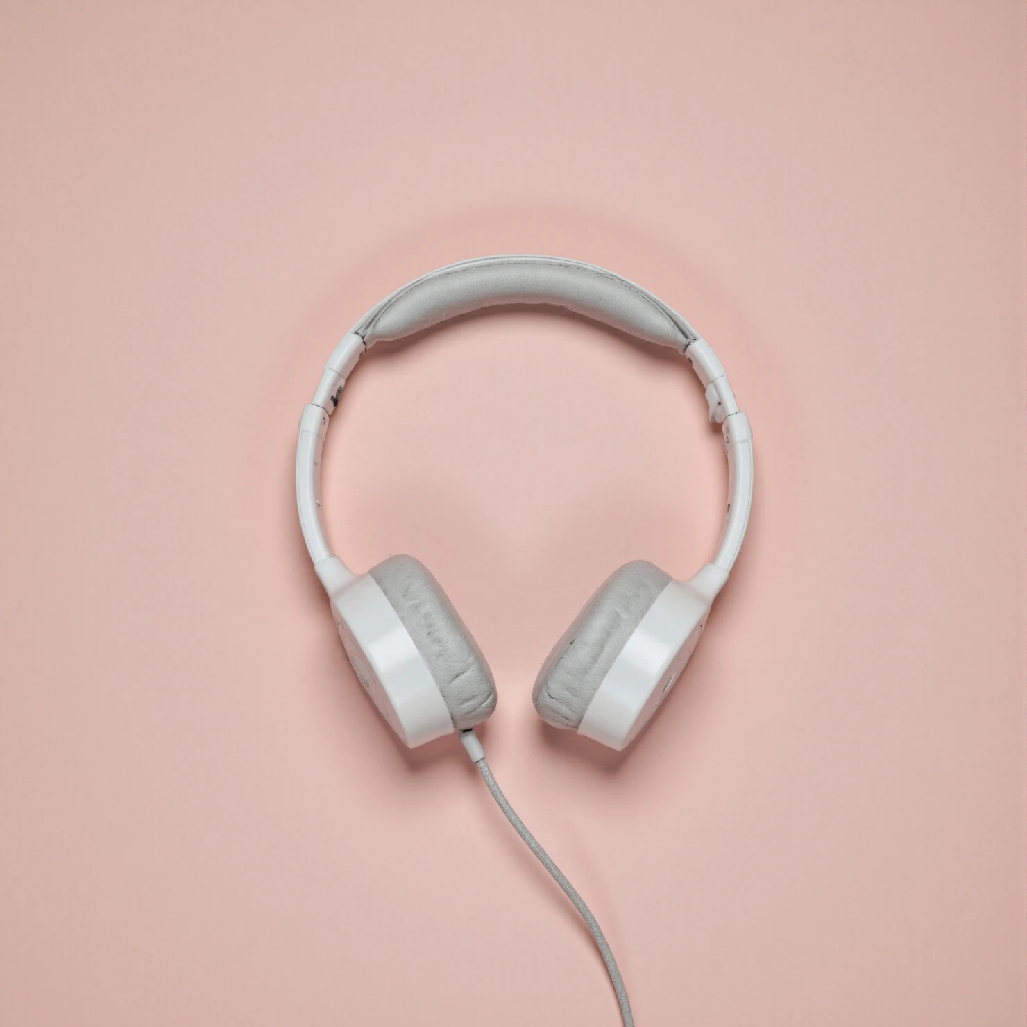 White Over-Ear Headphones on a Pink Background #40955