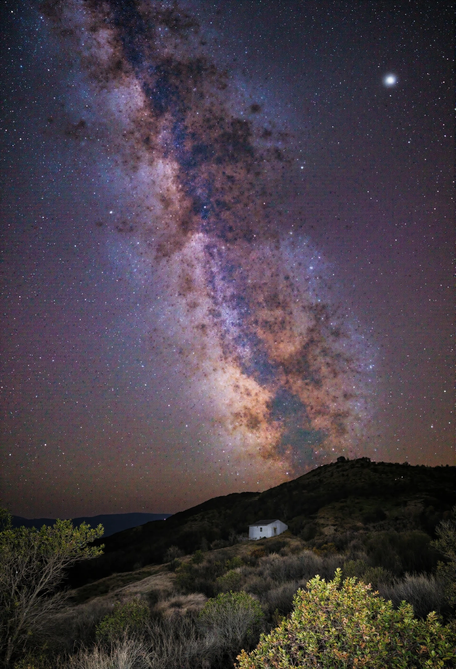Milky Way Galaxy Arching Over a Remote Mountain Cabin #40977