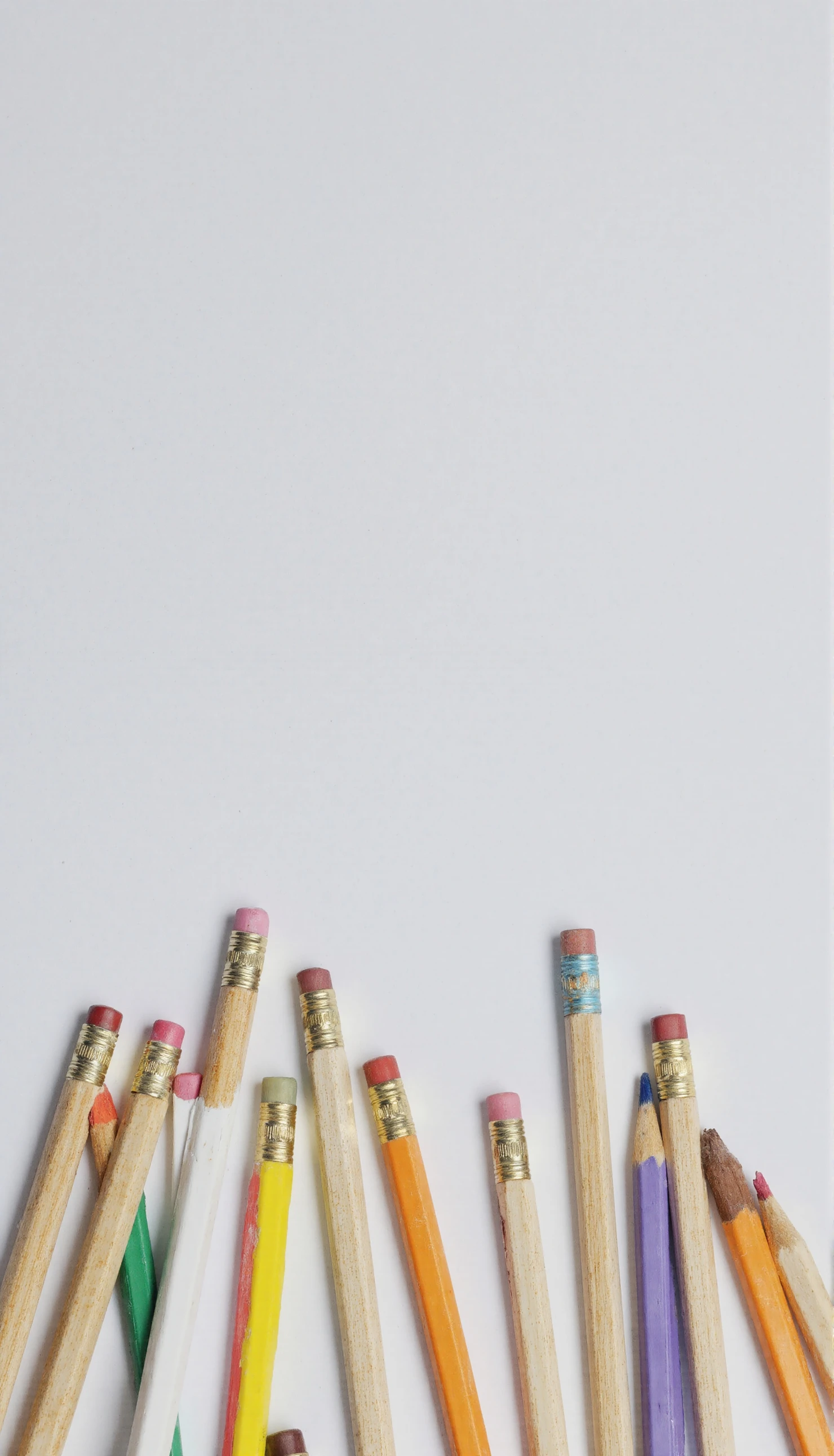 Assorted Pencils Scattered on a Clean White Background #40988