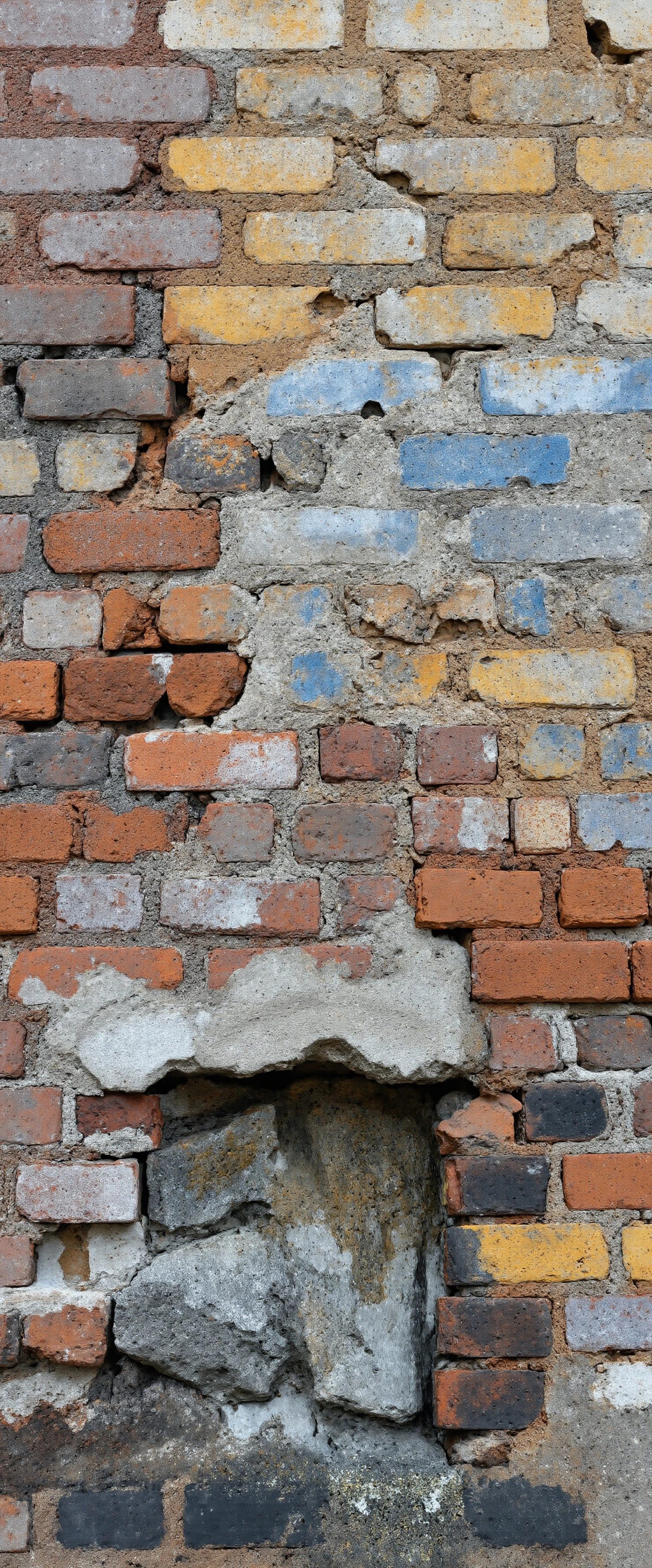 Textured Surface of a Multi-Colored Stone Wall #41005
