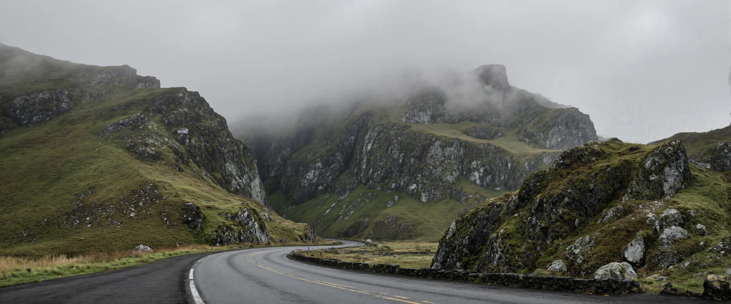 Winding Road Through Misty Mountain Pass #41040