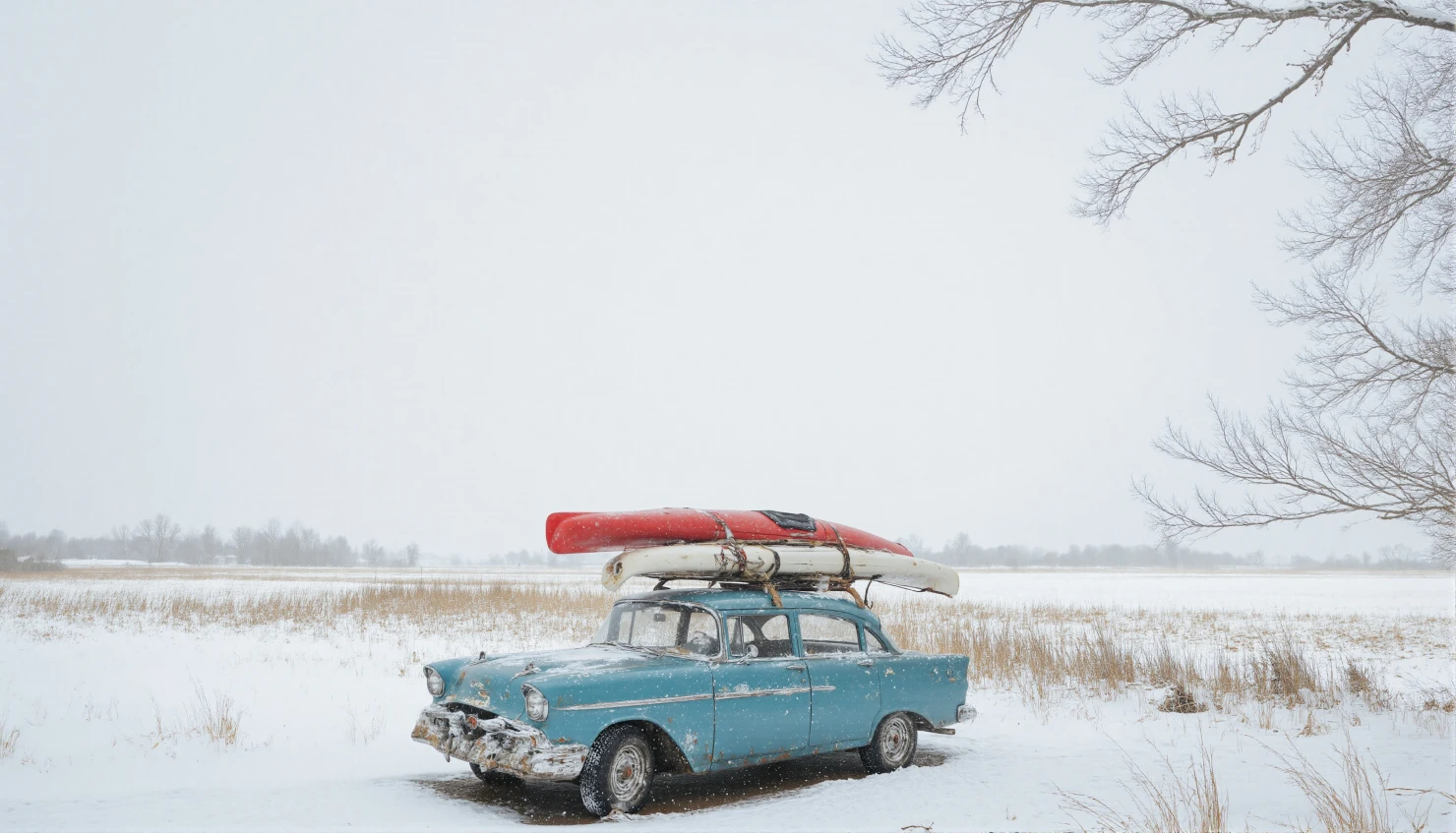Classic Car with Kayaks in a Snowy Winter Landscape #41043