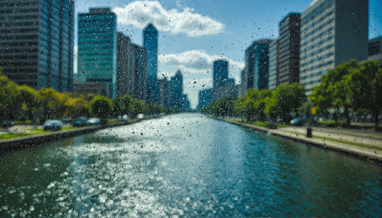 Rainy Cityscape View Through a Wet Window #41052