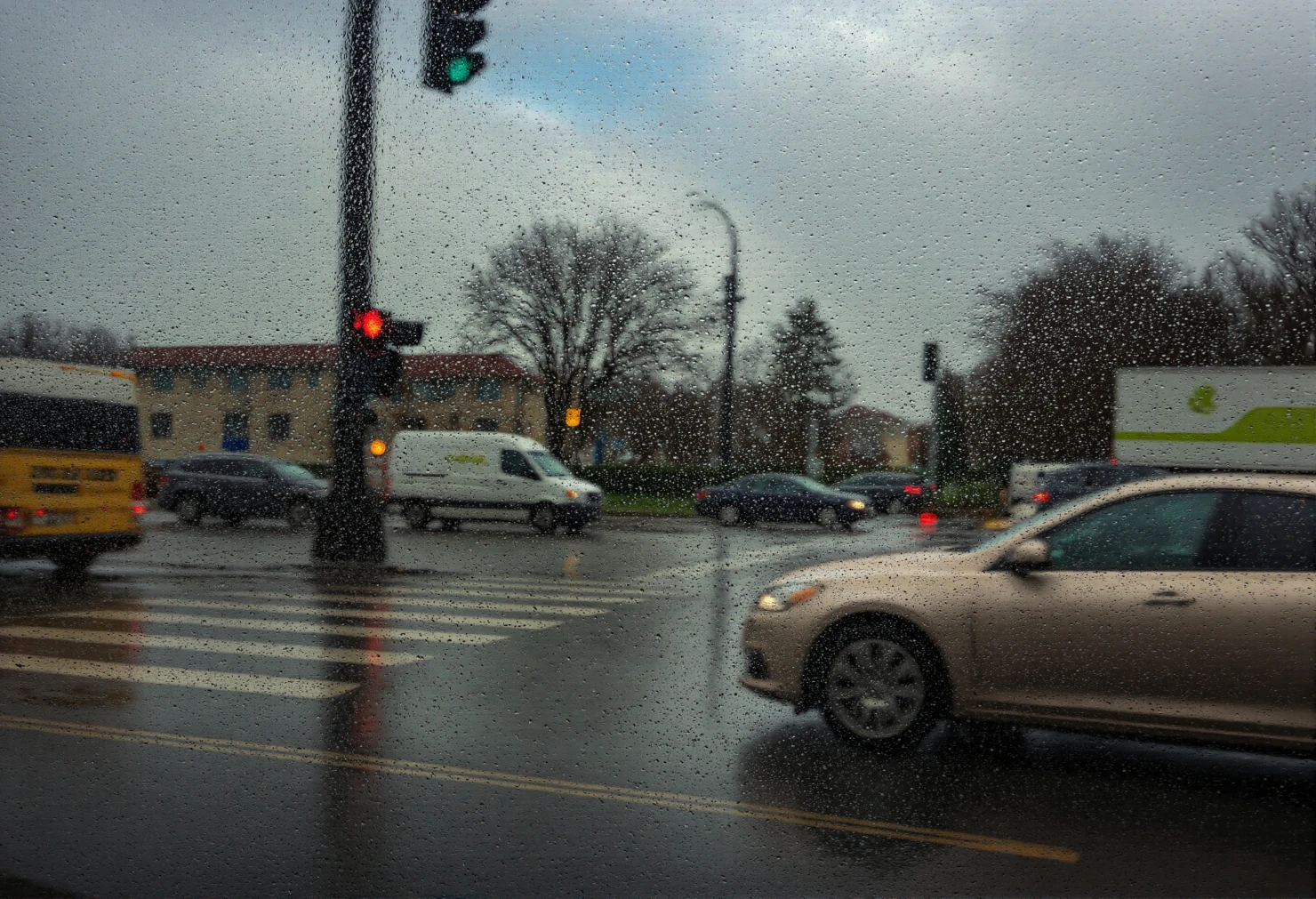 Rainy Day Traffic at an Urban Intersection from a Car Window #41054
