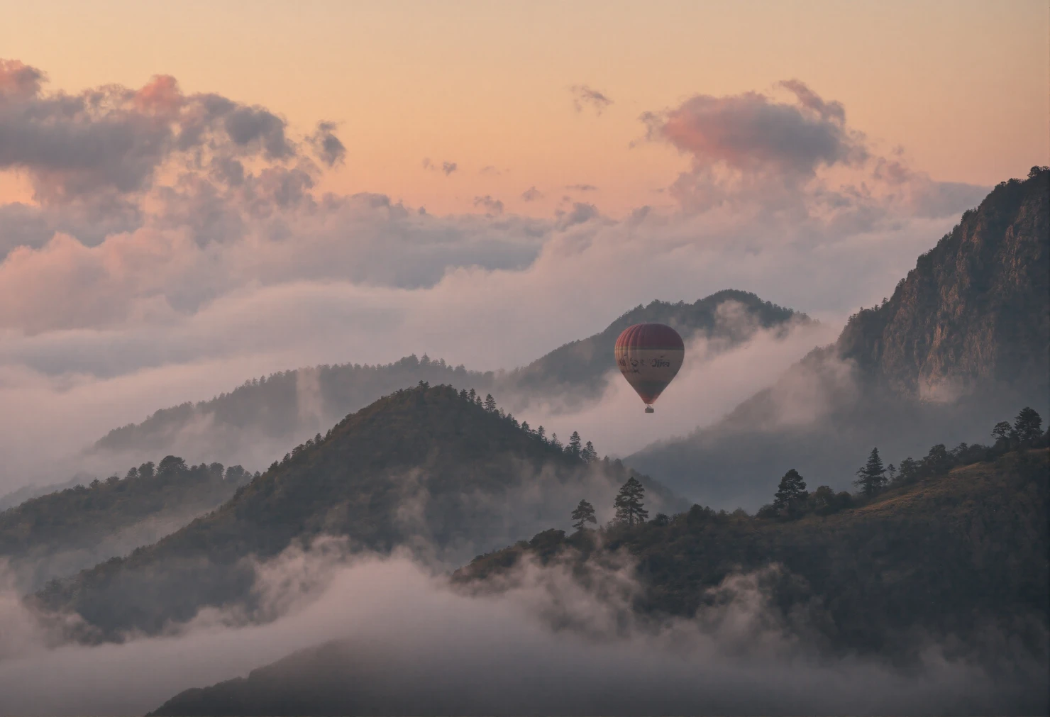 Hot Air Balloon Floating Above Misty Mountains at Sunrise #41101