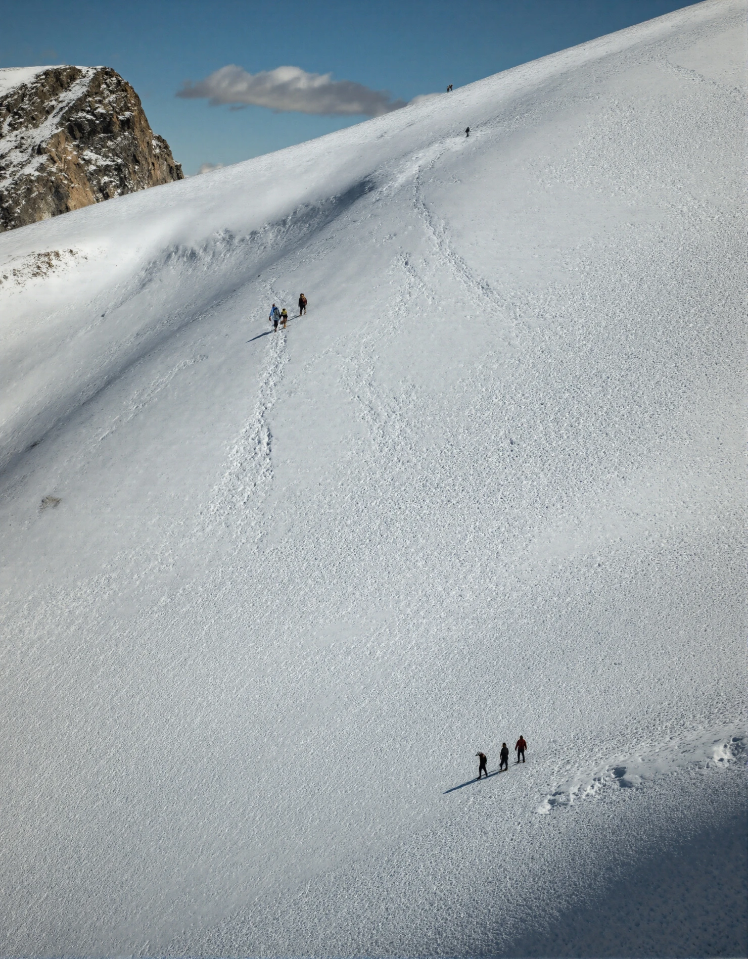 Hikers Ascending a Vast Snowy Mountain Slope #41261