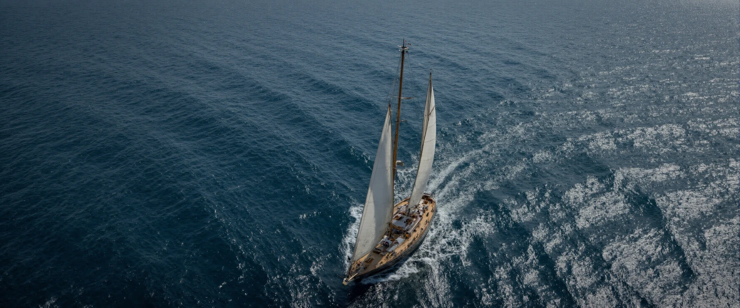 Classic Sailboat Gliding Through the Deep Blue Ocean Waves #41273